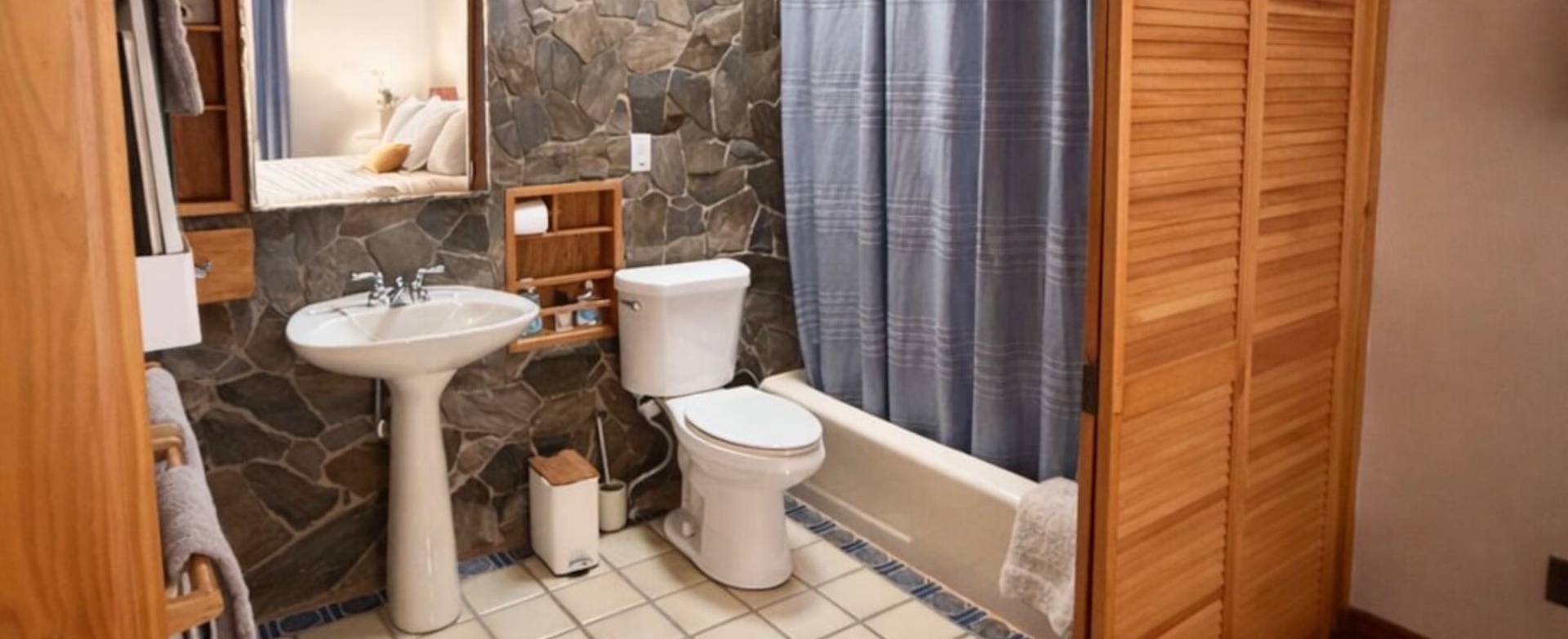 Guest Bath — Pedestal sink and soaking tub with cedar storage